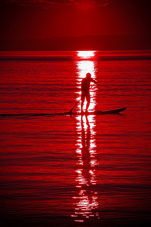 Red water paddleboarder